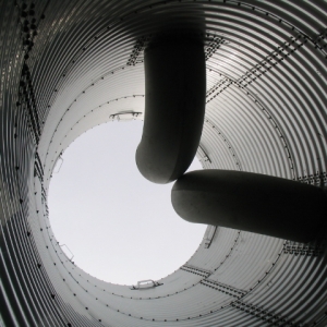 Stallkamp pipes in corrugated steel tank